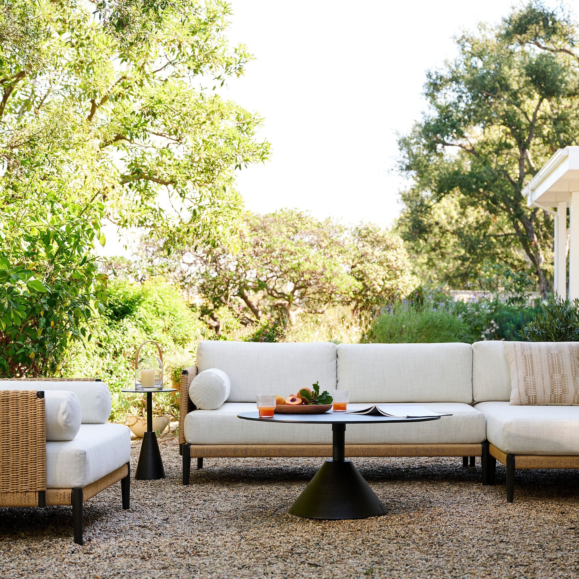 Modern Outdoor Sectional Sofa Set with Coffee Table and Cream Cushions
